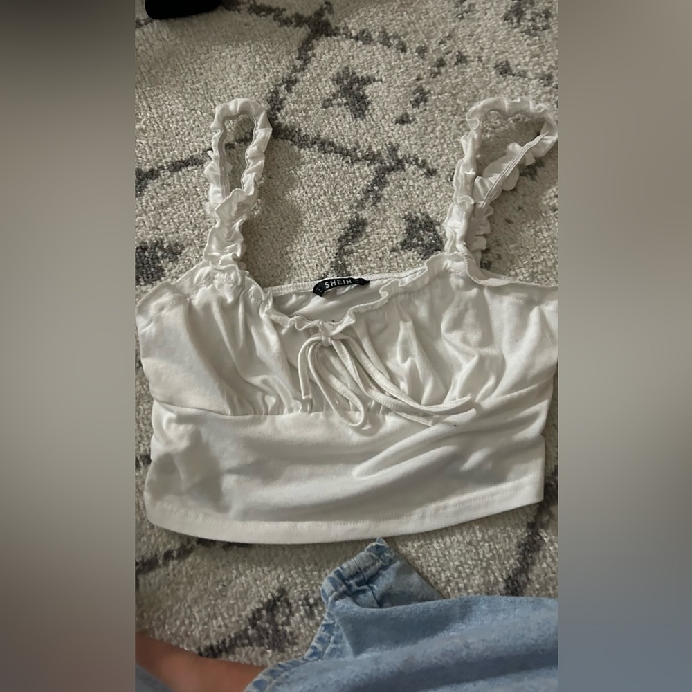 Ruffle going out top